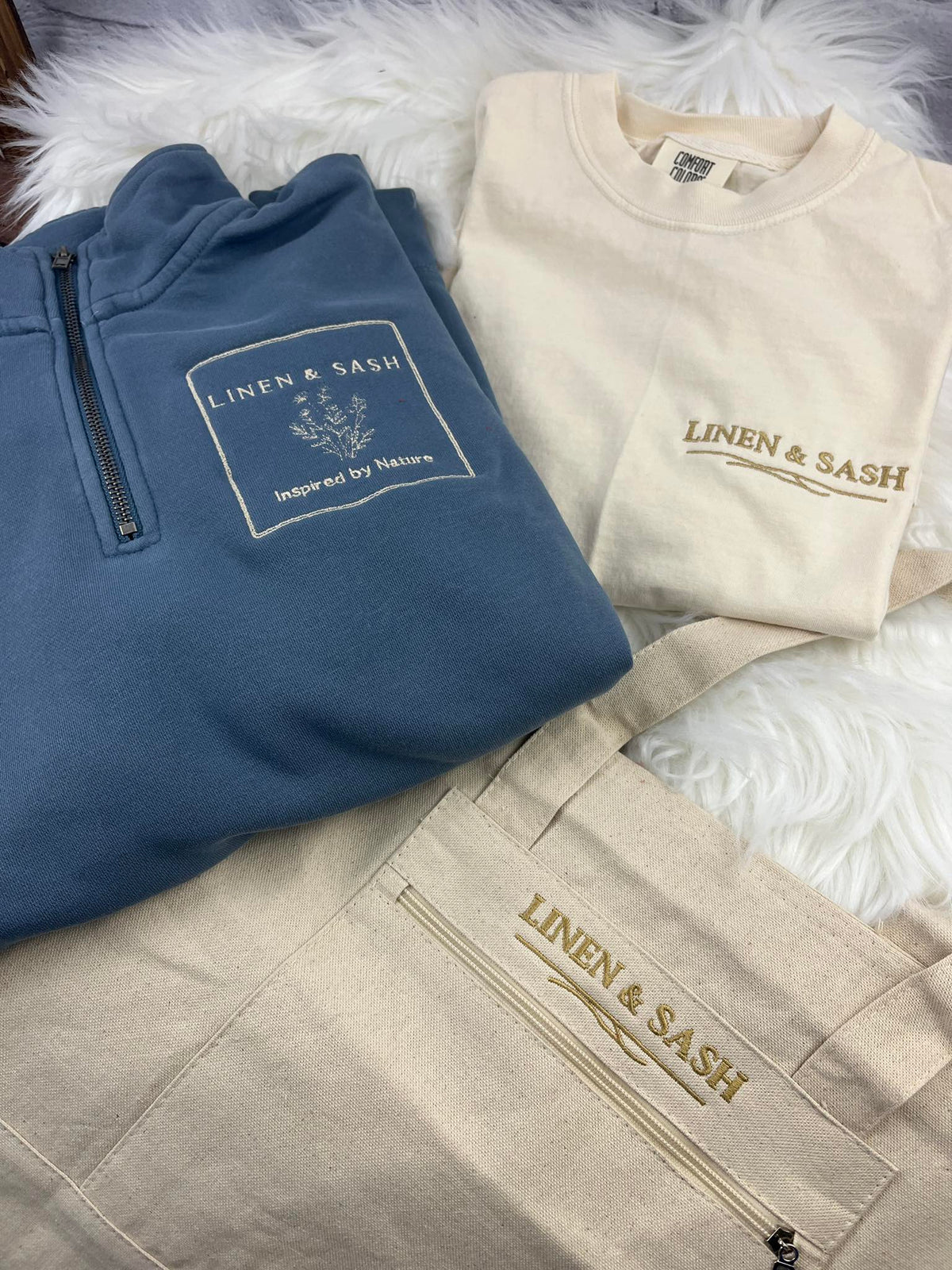 The Linen & Sash Lifestyle Set
Quarter Zip • Embroidered Tee • Canvas Tote
$99 (Save $18)